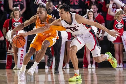 Jan 13, 2024; Athens, Georgia, USA; Tennessee Volunteers guard Jordan Gainey (2) and Georgia Bulldogs guard RJ Melendez (15) fight for the ball during the first half at Stegeman Coliseum. Mandatory Credit: Dale Zanine-USA TODAY Sports