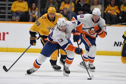 Jan 13, 2024; Nashville, Tennessee, USA; New York Islanders center Mathew Barzal (13) skates with the puck during the second period against the Nashville Predators at Bridgestone Arena. Mandatory Credit: Christopher Hanewinckel-USA TODAY Sports