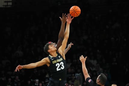 Jan 13, 2024; Boulder, Colorado, USA; USC Trojans forward Vincent Iwuchukwu (3) and Colorado Buffaloes forward Tristan da Silva (23) reach for the tip off in the first half at the CU Events Center. Mandatory Credit: Ron Chenoy-USA TODAY Sports