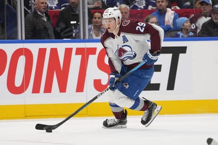 Jan 13, 2024; Toronto, Ontario, CAN; Colorado Avalanche forward Nathan MacKinnon (29)  carries the puck against the Toronto Maple Leafs during the second period at Scotiabank Arena. Mandatory Credit: John E. Sokolowski-USA TODAY Sports