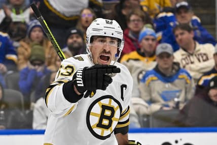 Jan 13, 2024; St. Louis, Missouri, USA;  Boston Bruins left wing Brad Marchand (63) reacts after scoring against the St. Louis Blues during the third period at Enterprise Center. Mandatory Credit: Jeff Curry-USA TODAY Sports