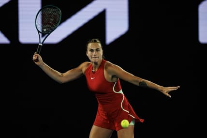 Jan 14, 2024; Melbourne, Victoria, Australia;  Aryna Sabalenka of Russia hits a shot against Ella Seidel of Germany in the first round of the women s singles. Mandatory Credit: Mike Frey-USA TODAY Sports