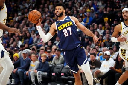 Jan 14, 2024; Denver, Colorado, USA; Denver Nuggets guard Jamal Murray (27) passes the ball in the first quarter against the Indiana Pacers at Ball Arena. Mandatory Credit: Ron Chenoy-USA TODAY Sports