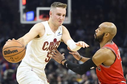 Jan 15, 2024; Cleveland, Ohio, USA; Cleveland Cavaliers guard Sam Merrill (5) dribbles beside Chicago Bulls guard Jevon Carter (5) in the second quarter at Rocket Mortgage FieldHouse. Mandatory Credit: David Richard-USA TODAY Sports