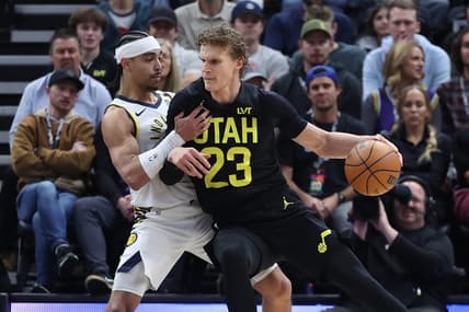 Jan 15, 2024; Salt Lake City, Utah, USA; Utah Jazz forward Lauri Markkanen (23) dribbles against Indiana Pacers guard Andrew Nembhard (2) during the first quarter at Delta Center. Mandatory Credit: Rob Gray-USA TODAY Sports
