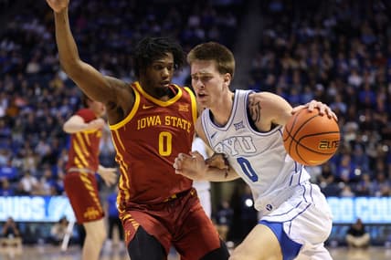 Jan 16, 2024; Provo, Utah, USA; Brigham Young Cougars forward Noah Waterman (0) drives to the basket against Iowa State Cyclones forward Tre King (0) during the first half at Marriott Center. Mandatory Credit: Rob Gray-USA TODAY Sports