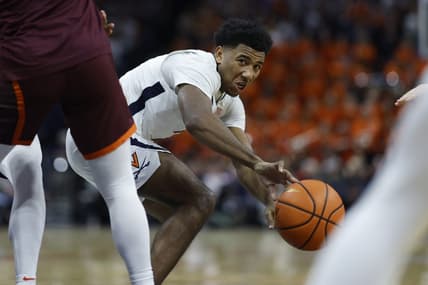 Jan 17, 2024; Charlottesville, Virginia, USA; Virginia Cavaliers guard Reece Beekman (2) passes the ball against the Virginia Tech Hokies in the second half at John Paul Jones Arena. Mandatory Credit: Geoff Burke-USA TODAY Sports