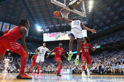 Jan 17, 2024; Chapel Hill, North Carolina, USA; North Carolina Tar Heels forward Jae'Lyn Withers (24) scores in the second half at Dean E. Smith Center. Mandatory Credit: Bob Donnan-USA TODAY Sports