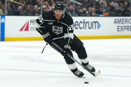 Jan 18, 2024; Los Angeles, California, USA; LA Kings right wing Quinton Byfield (55) skates with the puck against the Nashville Predators in the second period at Crypto.com Arena. Mandatory Credit: Kirby Lee-USA TODAY Sports
