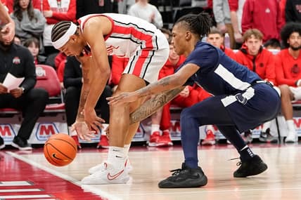 Jan 20, 2024; Columbus, Ohio, USA; Penn State Nittany Lions guard Nick Kern Jr. (3) pokes the ball out of bounds between the legs of Ohio State Buckeyes guard Roddy Gayle Jr. (1) during the second half of the NCAA men   s basketball game at Value City Arena. Ohio State won 79-67.