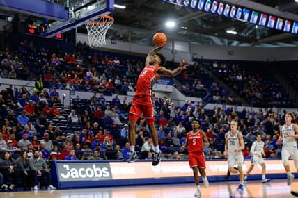 Jan 20, 2024; Colorado Springs, Colorado, USA; New Mexico Lobos guard Donovan Dent (2) dunks the ball in the second half against the Air Force Falcons at Clune Arena. Mandatory Credit: Isaiah J. Downing-USA TODAY Sports