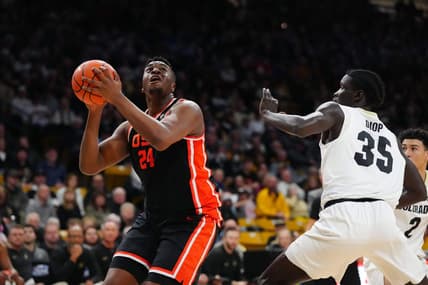 Jan 20, 2024; Boulder, Colorado, USA; Oregon State Beavers center KC Ibekwe (24) and Colorado Buffaloes forward Assane Diop (35) during the first half at the CU Events Center. Mandatory Credit: Ron Chenoy-USA TODAY Sports
