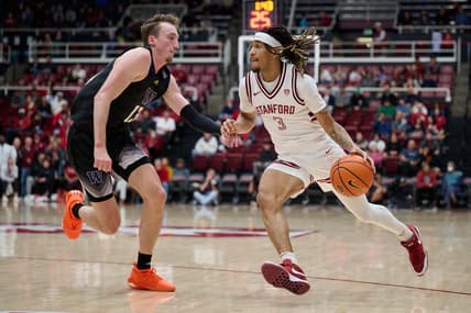 Jan 20, 2024; Stanford, California, USA; Stanford Cardinal guard Kanaan Carlyle (3) dribbles the ball against Washington Huskies forward Moses Wood (13) during the first half at Maples Pavilion. Mandatory Credit: Robert Edwards-USA TODAY Sports