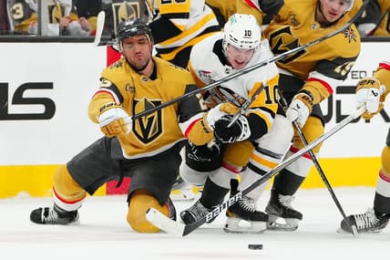 Jan 20, 2024; Las Vegas, Nevada, USA; Vegas Golden Knights defenseman Alec Martinez (23) keeps Pittsburgh Penguins left wing Drew O'Connor (10) from the puck during the second period at T-Mobile Arena. Mandatory Credit: Stephen R. Sylvanie-USA TODAY Sports