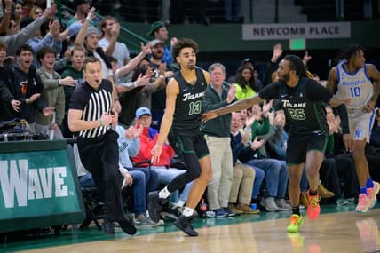Jan 21, 2024; New Orleans, Louisiana, USA; Tulane Green Wave guard Tre' Williams (13) celebrates a three point basket against the Memphis Tigers during the first half at Avron B. Fogelman Arena in Devlin Fieldhouse. Mandatory Credit: Matthew Hinton-USA TODAY Sports