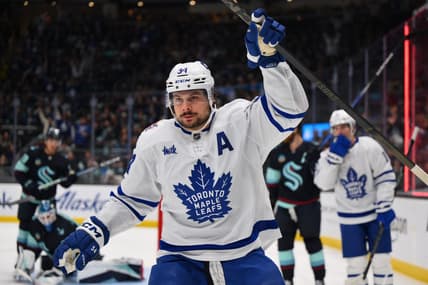 Jan 21, 2024; Seattle, Washington, USA; Toronto Maple Leafs center Auston Matthews (34) celebrates after scoring a goal against the Seattle Kraken during the first period at Climate Pledge Arena. Mandatory Credit: Steven Bisig-USA TODAY Sports