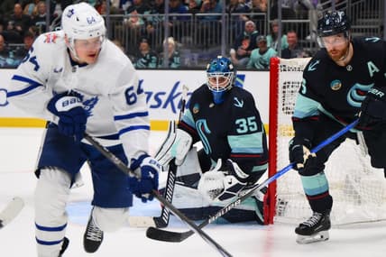 Jan 21, 2024; Seattle, Washington, USA; Seattle Kraken goaltender Joey Daccord (35) defends the goal during the third period against the Toronto Maple Leafs at Climate Pledge Arena. Mandatory Credit: Steven Bisig-USA TODAY Sports