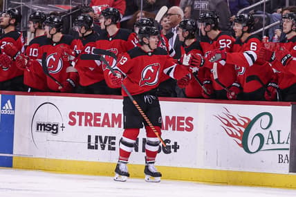 Jan 22, 2024; Newark, New Jersey, USA; New Jersey Devils center Nico Hischier (13) celebrates his goal with teammates during the second period against the Vegas Golden Knights at Prudential Center. Mandatory Credit: Vincent Carchietta-USA TODAY Sports