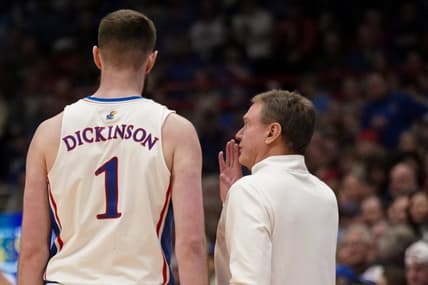 Jan 22, 2024; Lawrence, Kansas, USA; Kansas Jayhawks center Hunter Dickinson (1) talks with head coach Bill Self against the Cincinnati Bearcats during the first half at Allen Fieldhouse. Mandatory Credit: Denny Medley-USA TODAY Sports
