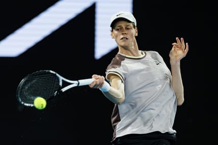 Jan 23, 2024; Melbourne, Victoria, Australia;  Jannik Sinner of Italy in action against Andrey Rublev of Russia in the quarter final of the men s singles. Mandatory Credit: Mike Frey-USA TODAY Sports