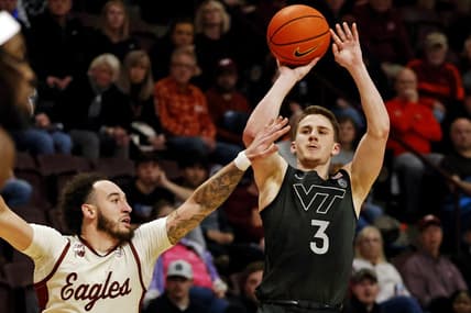 Jan 23, 2024; Blacksburg, Virginia, USA; Virginia Tech Hokies guard Sean Pedulla (3) shoots the ball against Boston College Eagles guard Jaeden Zackery (3) during the second half at Cassell Coliseum. Mandatory Credit: Peter Casey-USA TODAY Sports