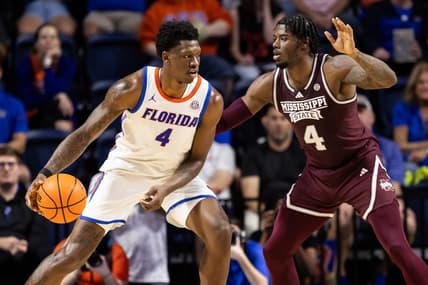 Jan 24, 2024; Gainesville, Florida, USA; Mississippi State Bulldogs forward Cameron Matthews (4) defends Florida Gators forward Tyrese Samuel (4) during the first half at Exactech Arena at the Stephen C. O'Connell Center. Mandatory Credit: Matt Pendleton-USA TODAY Sports