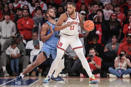 Jan 24, 2024; New York, New York, USA;  St. John's Red Storm center Joel Soriano (11) looks to post up against Villanova Wildcats forward Eric Dixon (43) in the first half at Madison Square Garden. Mandatory Credit: Wendell Cruz-USA TODAY Sports