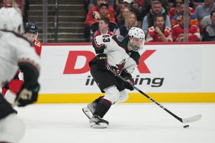 Jan 24, 2024; Sunrise, Florida, USA; Arizona Coyotes left wing Matias Maccelli (63) brings the puck up the ice during the first against the Florida Panthers at Amerant Bank Arena. Mandatory Credit: Jim Rassol-USA TODAY Sports