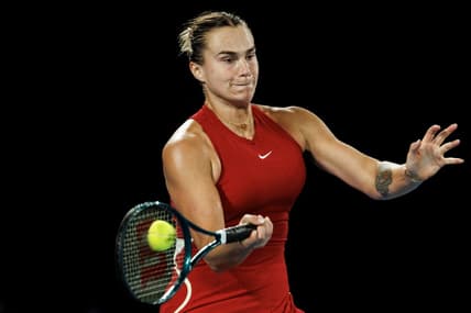 Jan 25, 2024; Melbourne, Victoria, Australia; Aryna Sabalenka of Belarus in action against Coco Gauff of the United States in the semi-final of the women s singles at the Australian Open. Mandatory Credit: Mike Frey-USA TODAY Sports