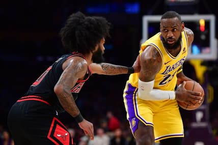 Jan 25, 2024; Los Angeles, California, USA; Los Angeles Lakers forward LeBron James (23) controls the ball against Chicago Bulls guard Coby White (0) during the first half at Crypto.com Arena. Mandatory Credit: Gary A. Vasquez-USA TODAY Sports