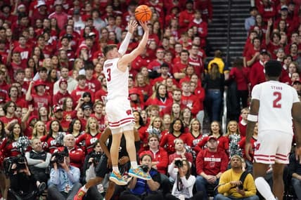 Jan 26, 2024; Madison, Wisconsin, USA; Wisconsin Badgers guard Connor Essegian (3) scores a three point basket against the Michigan State Spartans during the first half at the Kohl Center. Mandatory Credit: Kayla Wolf-USA TODAY Sports