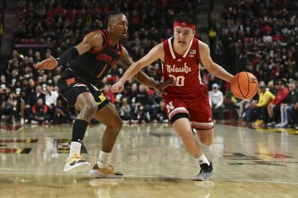 Jan 27, 2024; College Park, Maryland, USA;  Nebraska Cornhuskers guard Keisei Tominaga (30) drives to the basket on Maryland Terrapins guard Jahmir Young (1) during the first half at Xfinity Center. Mandatory Credit: Tommy Gilligan-USA TODAY Sports