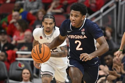 Jan 27, 2024; Louisville, Kentucky, USA;  Virginia Cavaliers guard Reece Beekman (2) dribbles against the Louisville Cardinals during the first half at KFC Yum! Center. Mandatory Credit: Jamie Rhodes-USA TODAY Sports