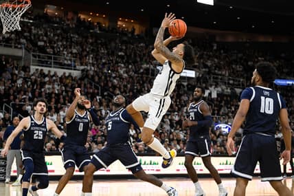 Jan 27, 2024; Providence, Rhode Island, USA; Providence Friars guard Devin Carter (22)  shoots during the first half against the Georgetown Hoyas at Amica Mutual Pavilion. Mandatory Credit: Eric Canha-USA TODAY Sports