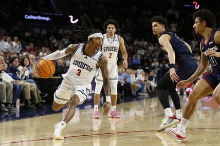 Jan 27, 2024; Richmond, Virginia, USA; Richmond Spiders guard DeLonnie Hunt (3) dribbles teh ball as Dayton Flyers guard Javon Bennett (0) defends during the first half at the Robins Center. Mandatory Credit: Amber Searls-USA TODAY Sports