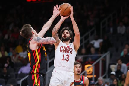 Mar 28, 2023; Atlanta, Georgia, USA; Cleveland Cavaliers guard Ricky Rubio (13) shoots over Atlanta Hawks guard Vit Krejci (27) in the second quarter at State Farm Arena. Mandatory Credit: Brett Davis-USA TODAY Sports