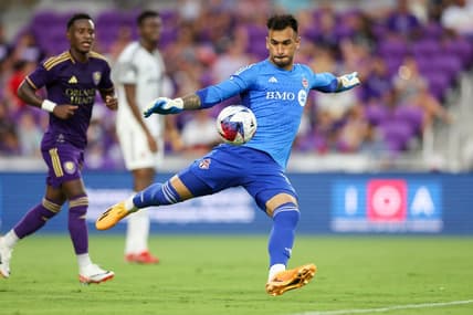Jul 4, 2023; Orlando, Florida, USA;  Toronto FC goalkeeper Greg Ranjitsingh (18) puts the ball in play against Orlando City SC in the first half at Exploria Stadium. Mandatory Credit: Nathan Ray Seebeck-USA TODAY Sports