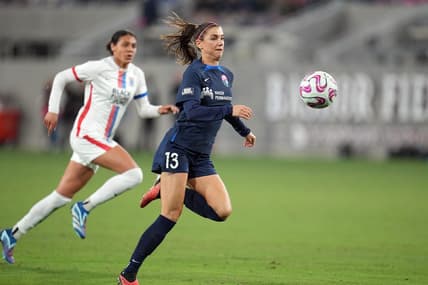 Nov 5, 2023; San Diego, California, USA; San Diego Wave FC forward Alex Morgan (13) controls the ball in the second half against the OL Reign at Snapdragon Stadium. Mandatory Credit: Ray Acevedo-USA TODAY Sports