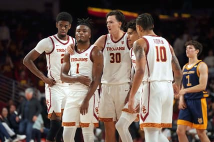Nov 14, 2023; Los Angeles, California, USA; Southern California Trojans forward Joshua Morgan (24), guard Isaiah Collier (1), forward Harrison Hornery (30), guard Oziyah Sellers (4) and forward DJ Rodman (10) react in the second half against the UC Irvine Anteaters at Galen Center. Mandatory Credit: Kirby Lee-USA TODAY Sports