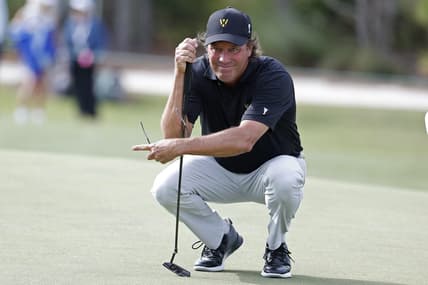 Dec 8, 2023; Bradenton, Florida, USA; Team International s Stephen Ames lines up a putt during their morning round at The Concession Golf Club. Mandatory Credit: Jeff Swinger-USA TODAY Sports