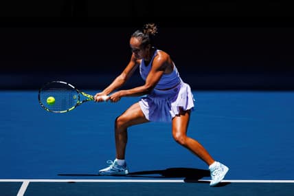 Jan 14, 2024; Melbourne, Victoria, Australia;  Leylah Fernandez of Canada hits a shot against Sarah Bejlek of the Czech Republic in the first round of the women s singles. Mandatory Credit: Mike Frey-USA TODAY Sports