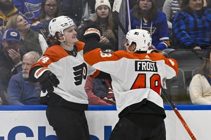 Jan 15, 2024; St. Louis, Missouri, USA;  Philadelphia Flyers right wing Owen Tippett (74) celebrates with center Morgan Frost (48) after scoring the game winning goal against the St. Louis Blues during the third period at Enterprise Center. Mandatory Credit: Jeff Curry-USA TODAY Sports