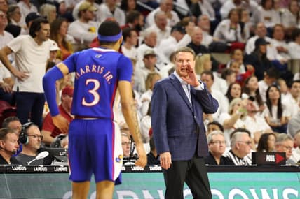 Feb 4, 2023; Ames, Iowa, USA;  Kansas Jayhawks head coach Bill Self talks with guard Dajuan Harris Jr. (3) during a game against the Iowa State Cyclones at James H. Hilton Coliseum. Mandatory Credit: Reese Strickland-USA TODAY Sports