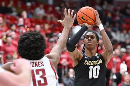 Jan 27, 2024; Pullman, Washington, USA; Colorado Buffaloes forward Cody Williams (10) shoots the ball against Washington State Cougars forward Isaac Jones (13) in the first half at Friel Court at Beasley Coliseum. Mandatory Credit: James Snook-USA TODAY Sports