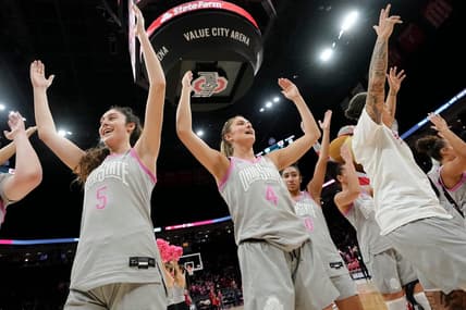 Feb 1, 2024; Columbus, OH, USA; Ohio State Buckeyes guard Emma Shumate (5) and guard Jacy Sheldon (4) sing    Carmen Ohio    following their 87-49 win over the Wisconsin Badgers in the NCAA women   s basketball game at Value City Arena.