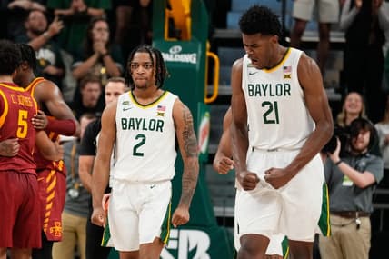Feb 3, 2024; Waco, Texas, USA; Baylor Bears guard Jayden Nunn (2) and Baylor Bears center Yves Missi (21) reacts after Baylor Bears guard Jayden Nunn (2) scores and is fouled in the closing moments against the  Iowa State Cyclones at Paul and Alejandra Foster Pavilion. Mandatory Credit: Chris Jones-USA TODAY Sports