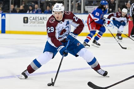 Feb 5, 2024; New York, New York, USA;  Colorado Avalanche center Nathan MacKinnon (29) skates with the puck against the New York Rangers during the second period at Madison Square Garden. Mandatory Credit: Dennis Schneidler-USA TODAY Sports