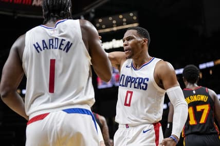 Feb 5, 2024; Atlanta, Georgia, USA; LA Clippers guard Russell Westbrook (0) reacts with guard James Harden (1) against the Atlanta Hawks during the second half at State Farm Arena. Mandatory Credit: Dale Zanine-USA TODAY Sports