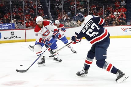 Feb 6, 2024; Washington, District of Columbia, USA; Washington Capitals left wing Max Pacioretty (67) shoots the puck as Montreal Canadiens defenseman David Savard (58) defends in the first period at Capital One Arena. Mandatory Credit: Geoff Burke-USA TODAY Sports
