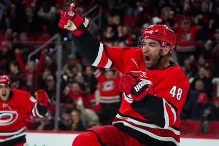 Feb 6, 2024; Raleigh, North Carolina, USA; Carolina Hurricanes left wing Jordan Martinook (48) celebrates his goal against the Vancouver Canucks during the first period at PNC Arena. Mandatory Credit: James Guillory-USA TODAY Sports
